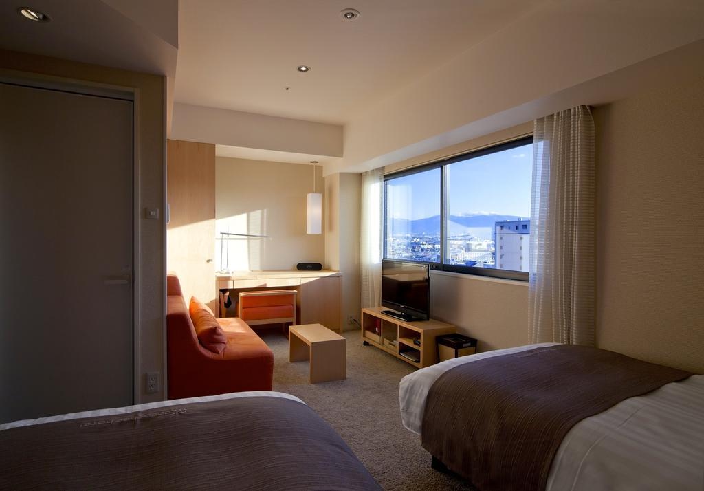 Cocochee Hotel Numazu Værelse billede
