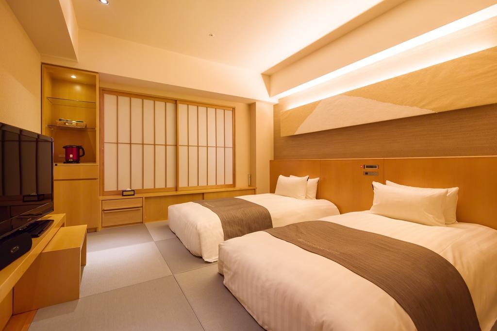 Cocochee Hotel Numazu Værelse billede